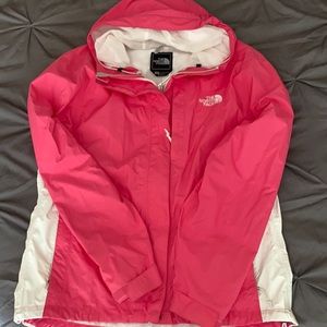 The North Face pink women’s size medium rain jacket.